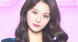 NMIXX’s Sullyoon is sporting an image of a male idol on her phone?